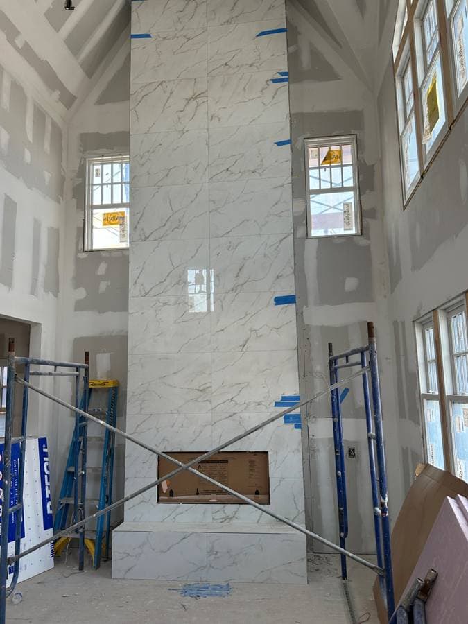picture of a commercial building in long island new york city being updated with tile and windows